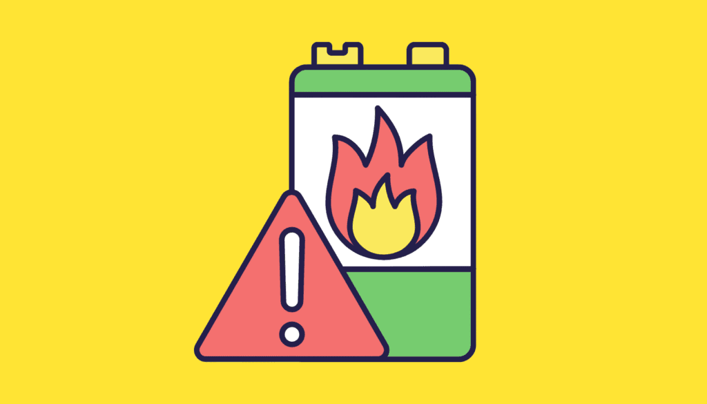 発火し、警告マークがついたバッテリーのイラスト。モバイルバッテリーが燃えた際の正しい初期対応と避難方法を解説。
